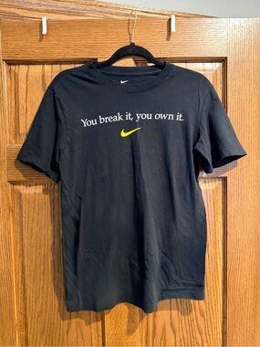 Nike Women’s Black Tee with Yellow Swoosh and White Text